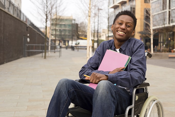 Image of a young man in a wheel chair